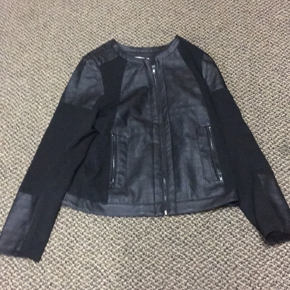 Black leather Long sleeve vest.